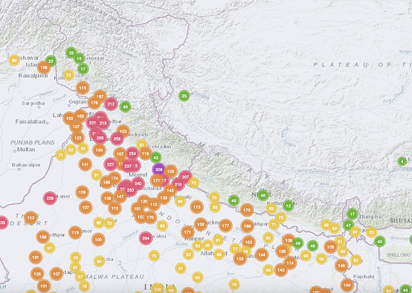 Air Quality Index (AQI) map from AQI.in showing high pollution levels across the Indo-Gangetic Plain, with Delhi and nearby northern regions marked in red and orange, indicating poor air quality.